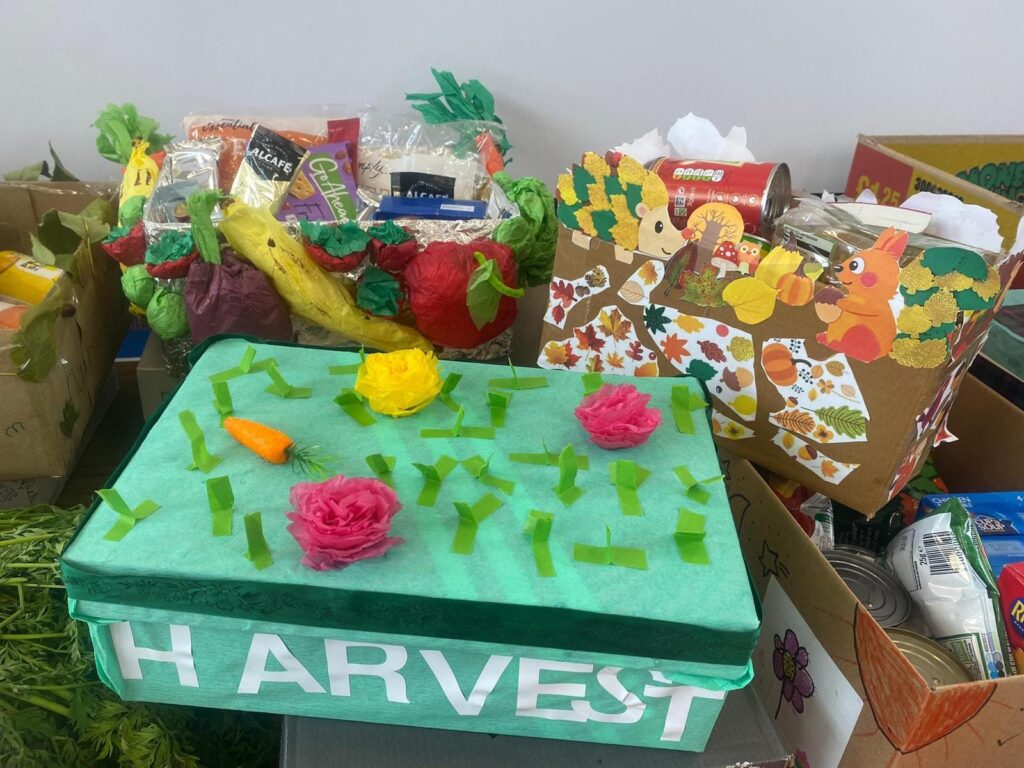 An image of multiple decorated harvest boxes on a table