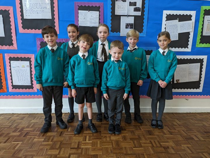 Photo showing winners of the Horsmonden Hero award smiling for the camera.