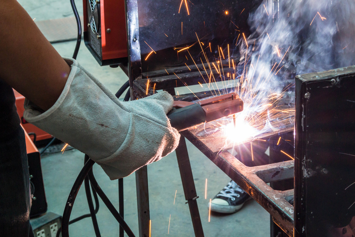 Welding metal on iron plate