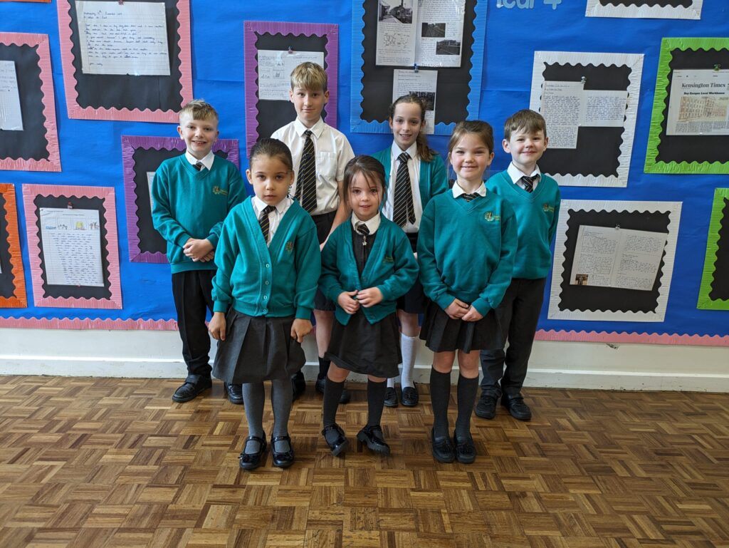 Photo showing winners of the Horsmonden Hero award smiling for the camera.