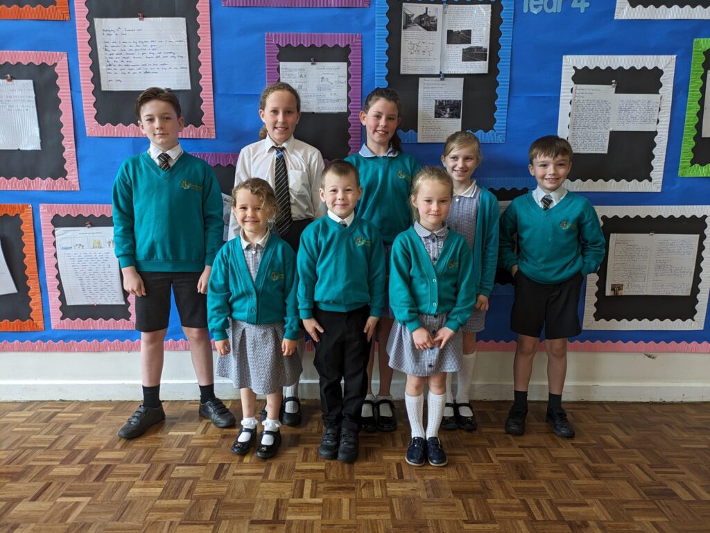 Photo showing winners of the Horsmonden Hero award smiling for the camera.