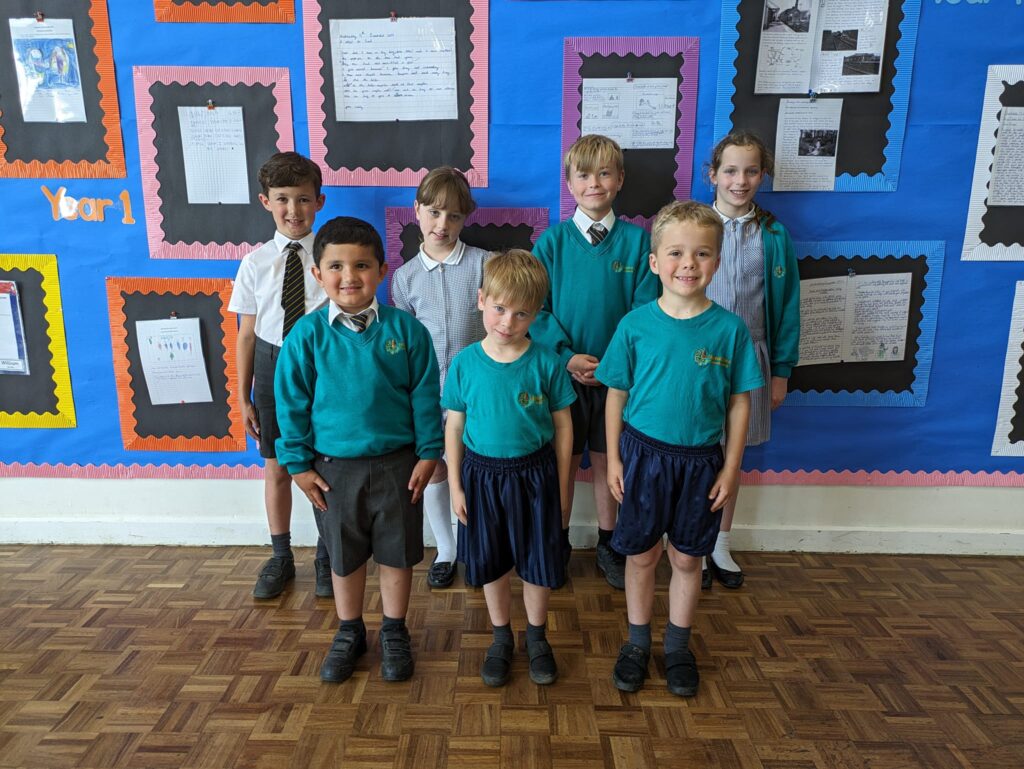 Photo showing winners of the Horsmonden Hero award smiling for the camera.